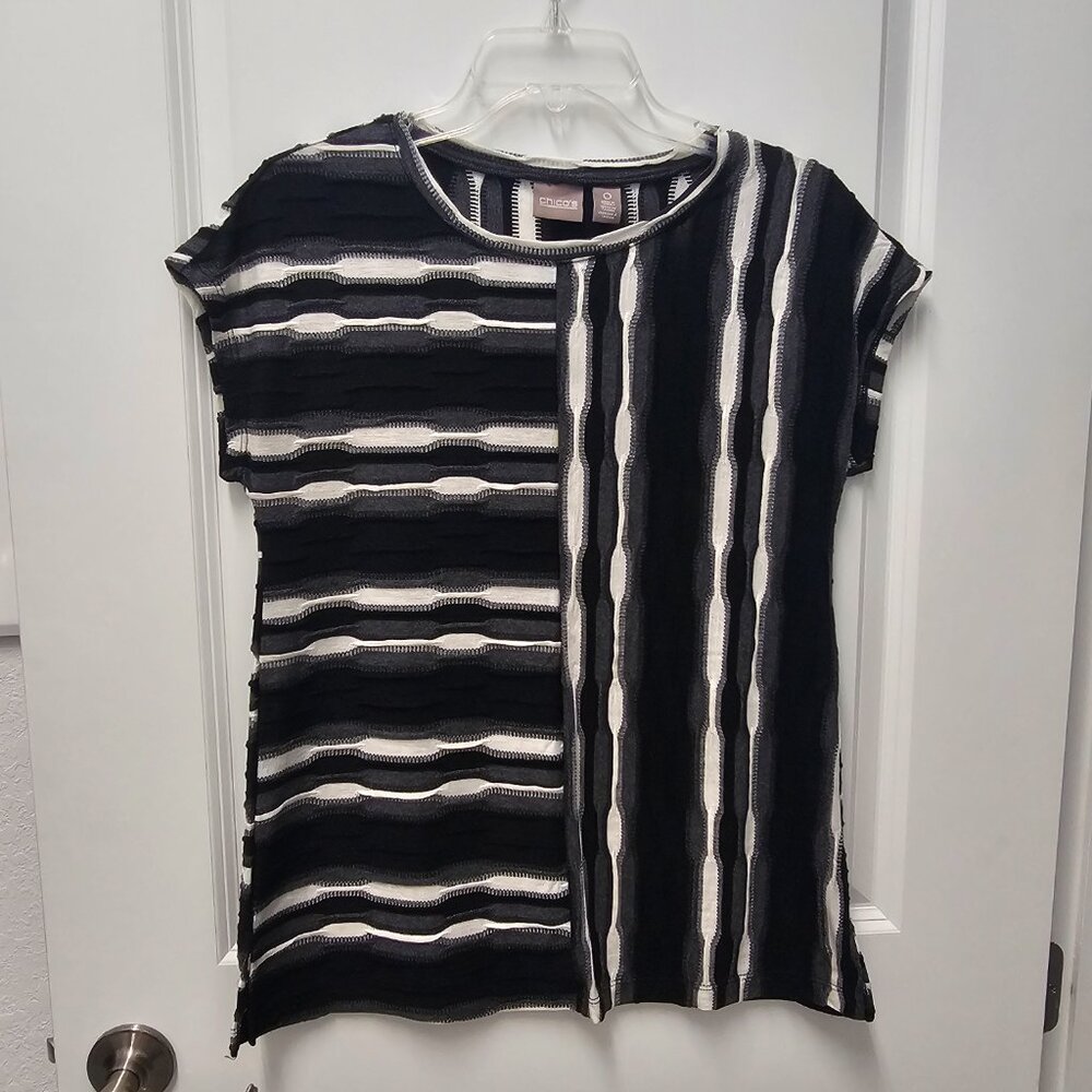 Chicos black and white top. Size 0.  Very soft and comfortable